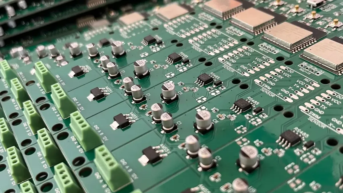 Panels of assembled PCBs from a production run