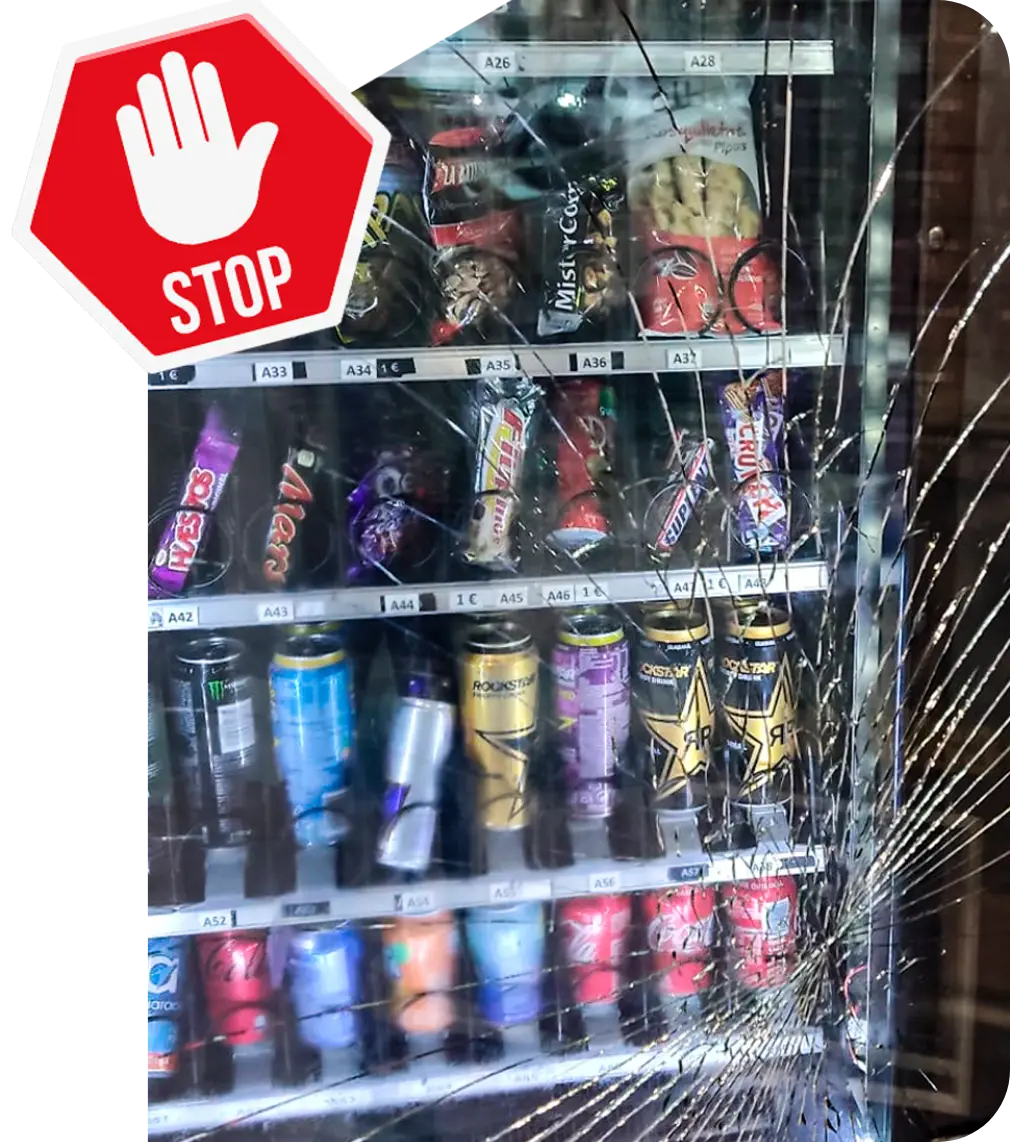 Vending machine with glass damaged by vandalism